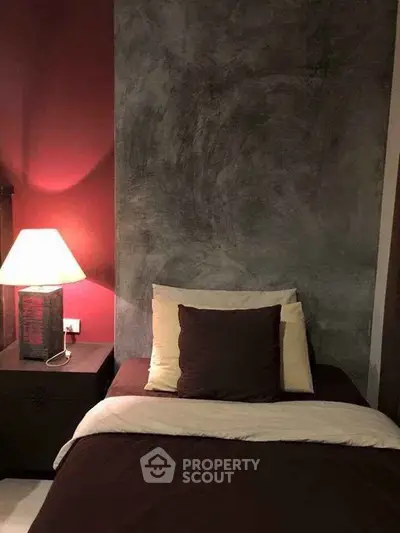 Cozy bedroom with modern decor and ambient lighting