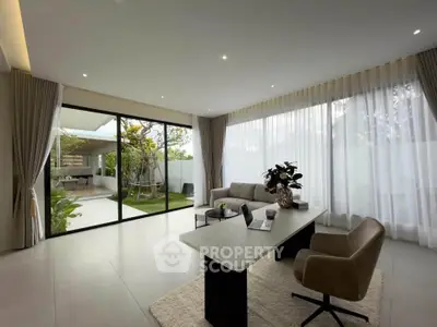 Spacious modern living room with garden view and elegant decor