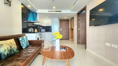 Modern living room with stylish decor and open kitchen layout