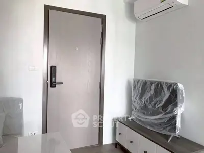 Modern apartment interior with air conditioning and TV setup