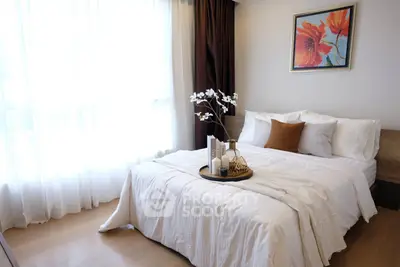 Elegant bedroom with natural light and stylish decor