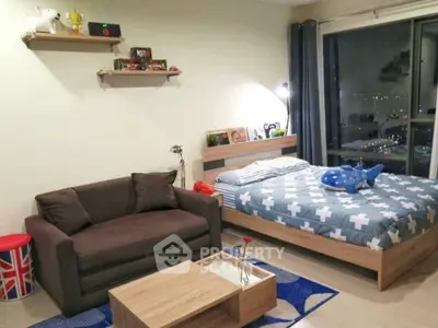 Cozy bedroom with city view, featuring modern furniture and stylish decor, perfect for urban living.