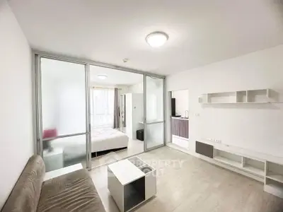 Modern studio apartment with open layout and sleek furnishings