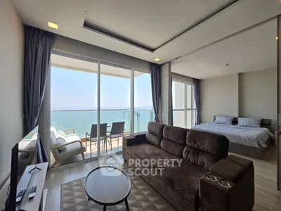 Luxurious beachfront living room with stunning ocean view and modern furnishings