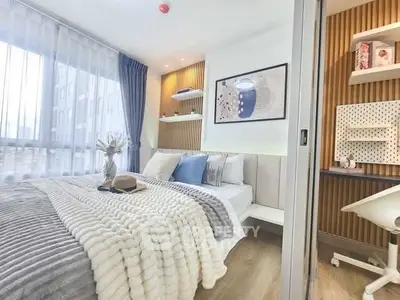 Modern bedroom with cozy decor and natural light