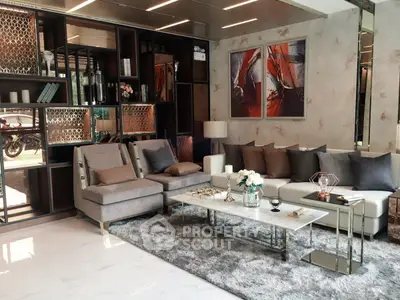 Luxurious modern living room with elegant decor and plush seating