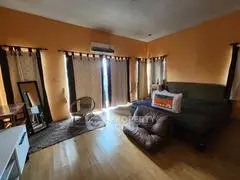 Cozy living room with warm lighting and comfortable seating