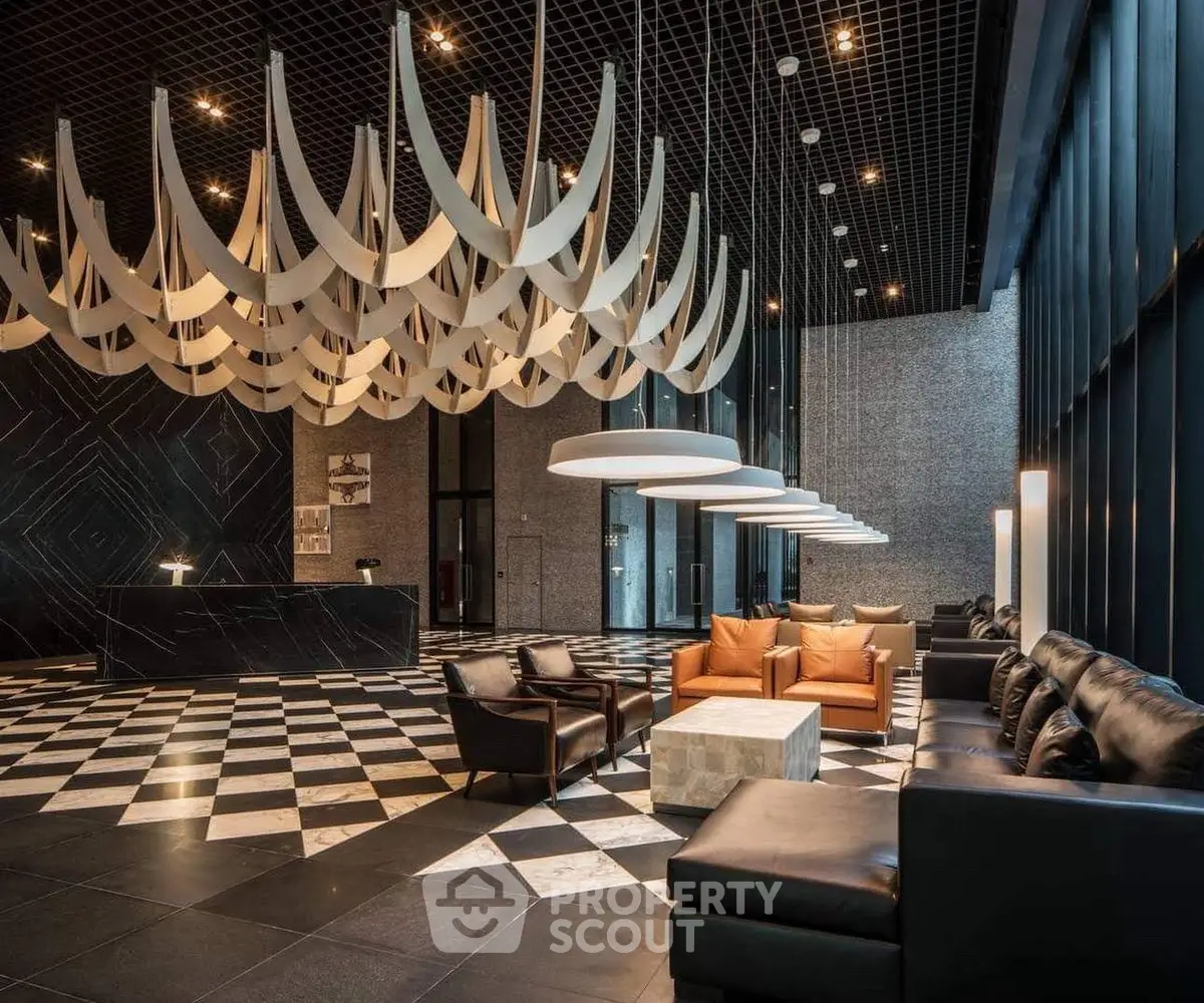Luxurious modern lobby with stylish seating and unique ceiling design