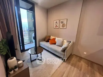 Cozy living room with modern decor and balcony view in urban apartment