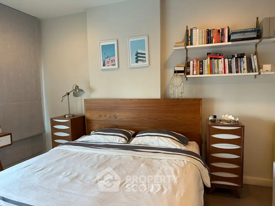 Cozy bedroom with stylish wooden furniture and modern decor, perfect for relaxation and comfort.