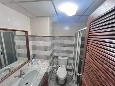 Modern bathroom with sleek design and marble accents