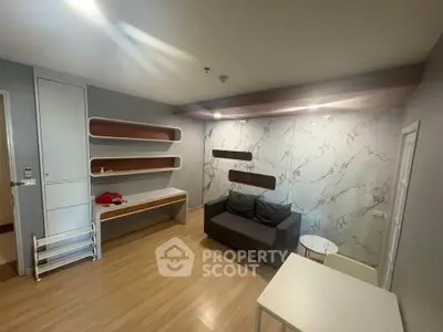 Modern living room with stylish wall design and cozy seating area