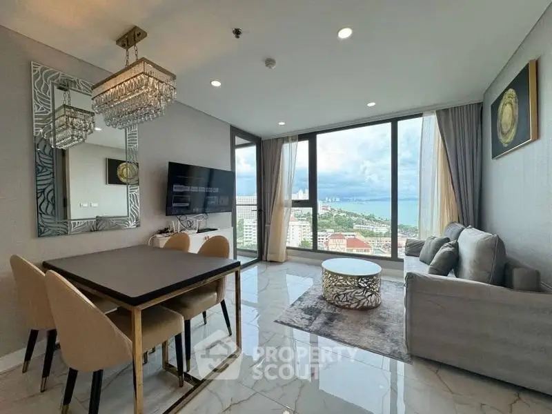 Luxurious living room with stunning ocean view and elegant decor