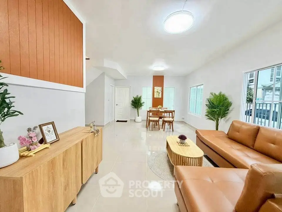 Spacious modern living room with elegant decor and natural light