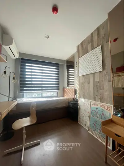 Modern study room with large window and stylish decor