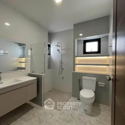 Modern bathroom with sleek design and ambient lighting