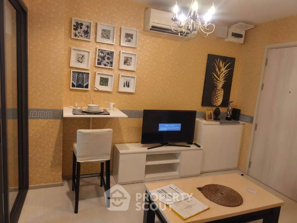 Charming living room with elegant decor and modern amenities, perfect for cozy living.
