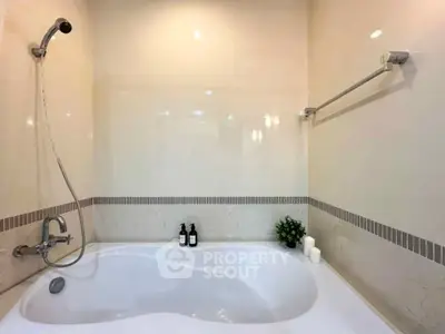 Modern bathroom with elegant bathtub and sleek fixtures