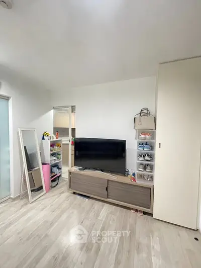 Modern living room with sleek TV stand and ample storage space