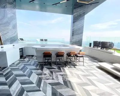 Luxurious rooftop with modern bar and stunning city view