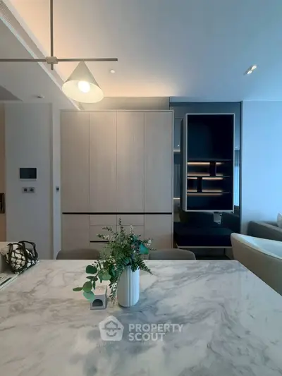 Modern living room with elegant marble table and stylish lighting