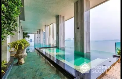 Luxurious infinity pool with stunning ocean view and elegant architectural design