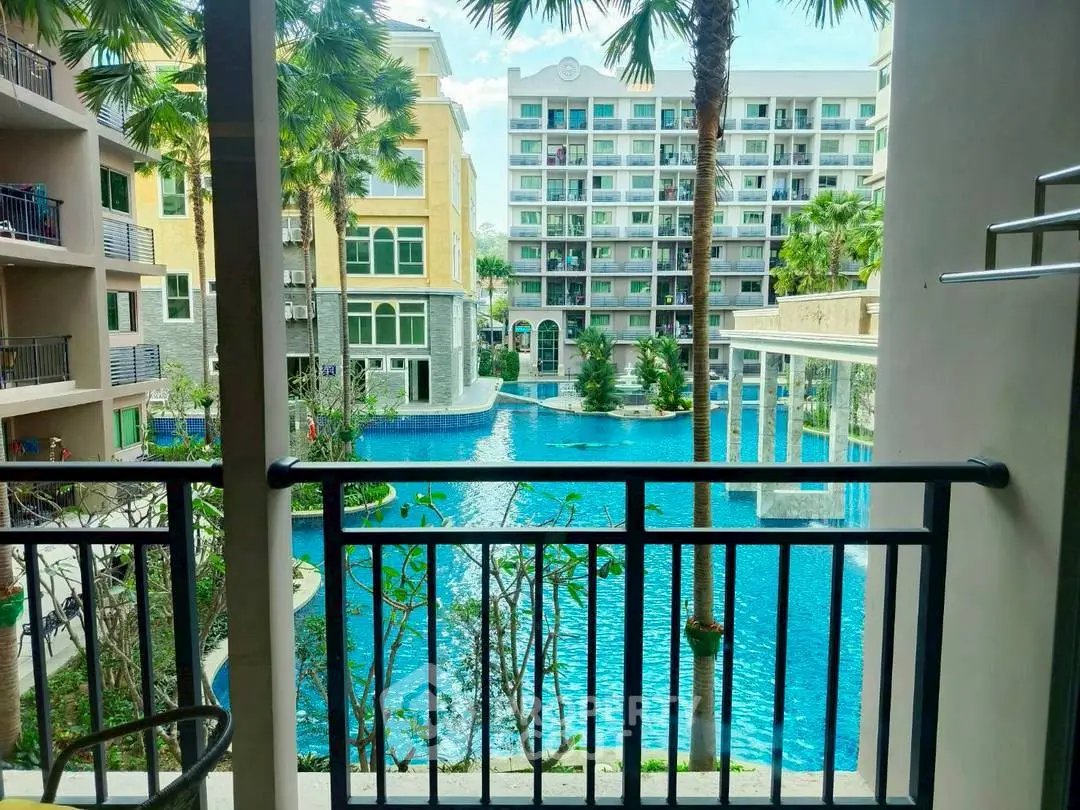 Stunning view of modern apartment complex with poolside balcony