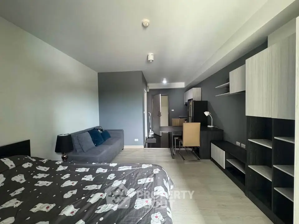 Modern studio apartment with stylish furniture and open layout