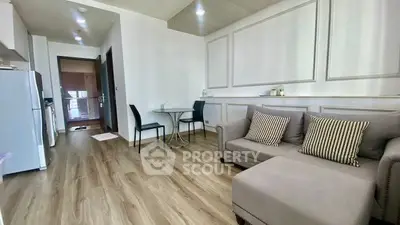 Modern living room with stylish decor and cozy furniture in a contemporary apartment.