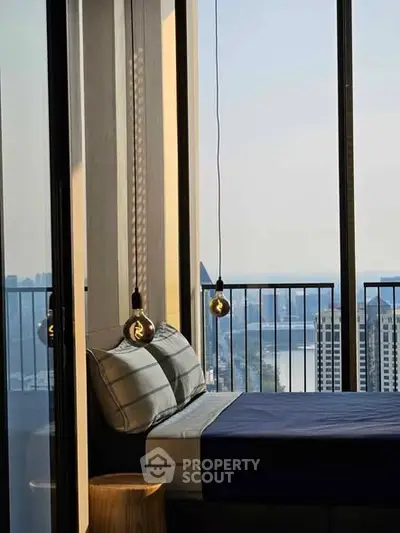 Modern bedroom with stunning city view and hanging lights