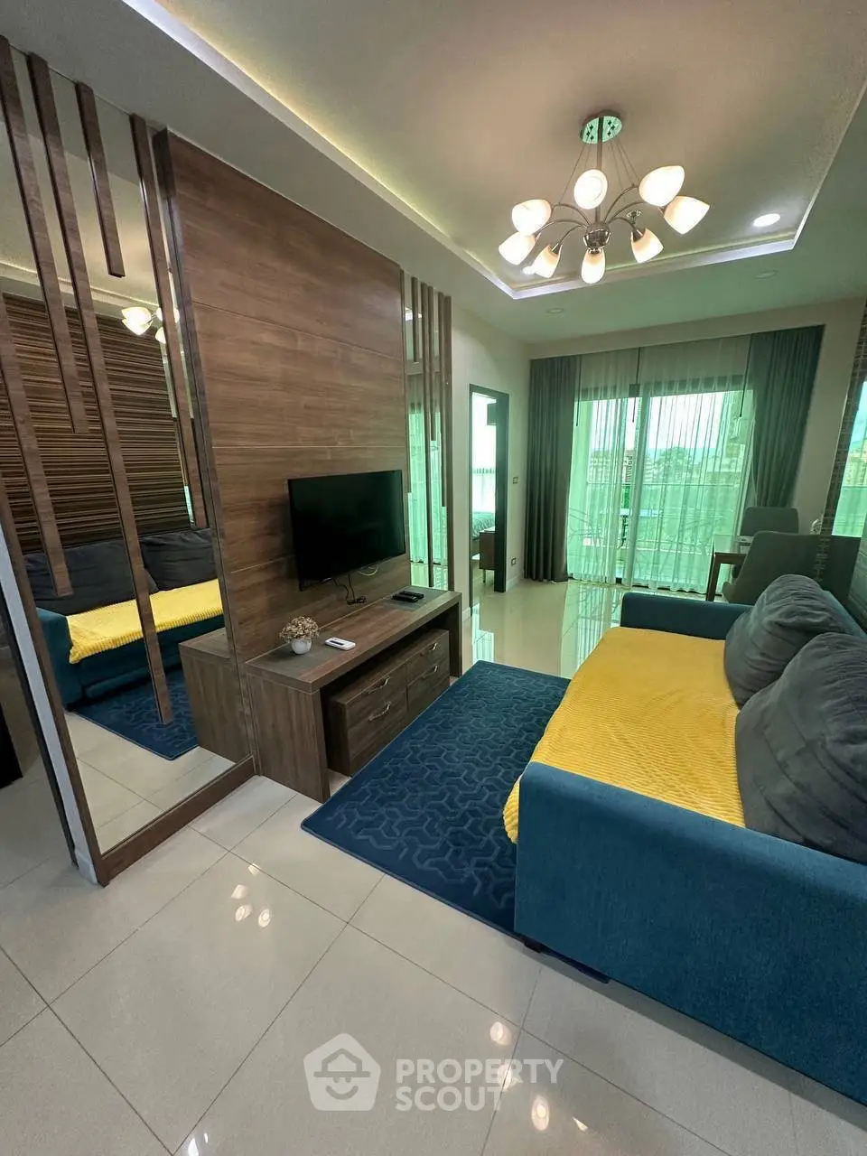 Modern living room with stylish decor and large windows for natural light