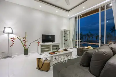 Luxurious modern living room with elegant decor and stunning evening view.