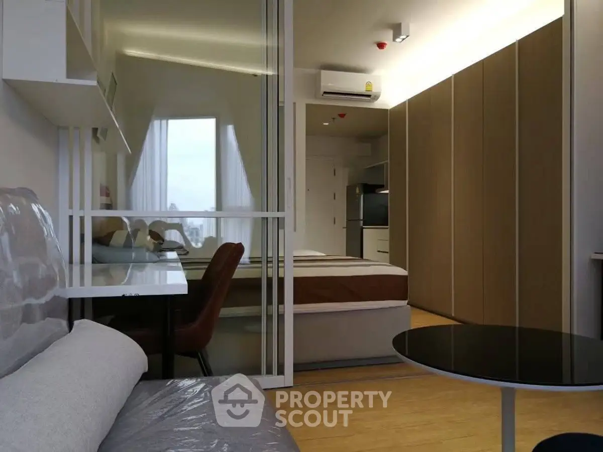 Modern studio apartment with sleek design and natural light