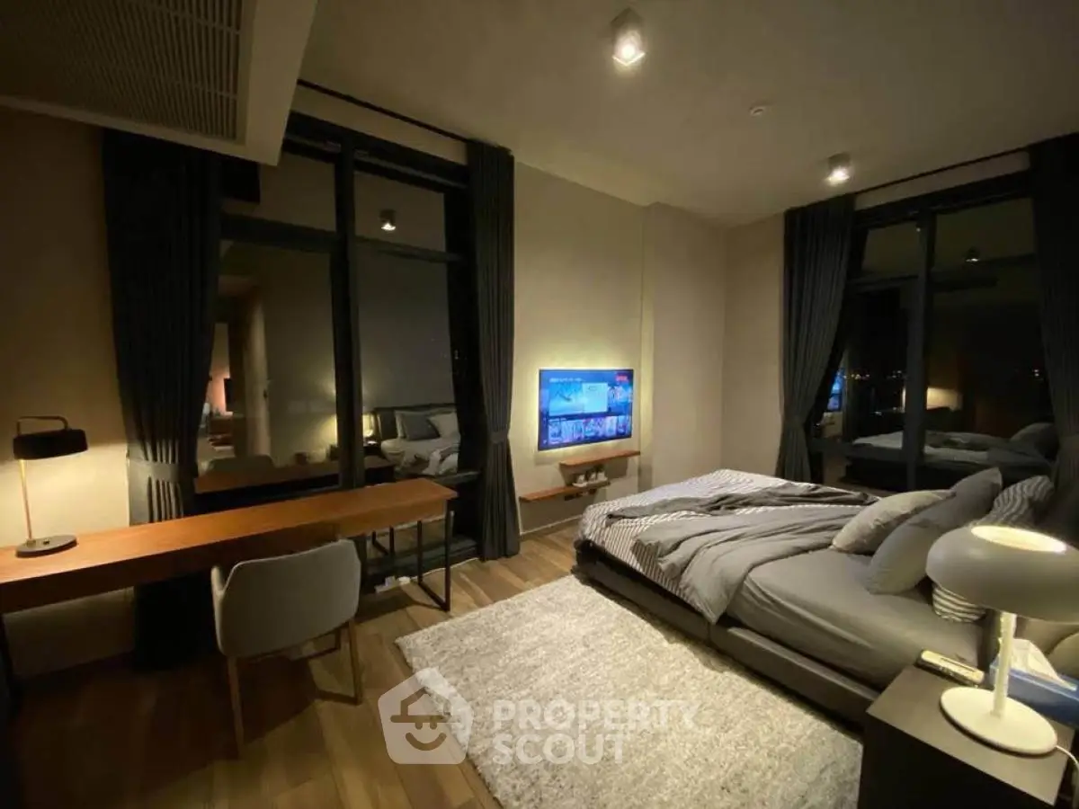 Luxurious modern bedroom with elegant decor and ambient lighting