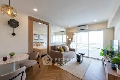 Modern living room with open layout and balcony view in stylish apartment