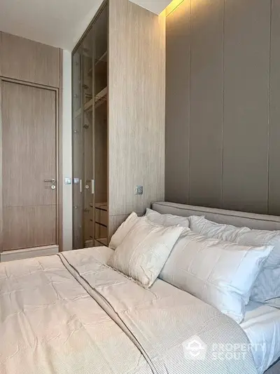 Modern bedroom with elegant design and built-in wardrobe