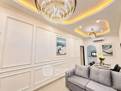 Elegant living room with luxurious chandelier and modern decor