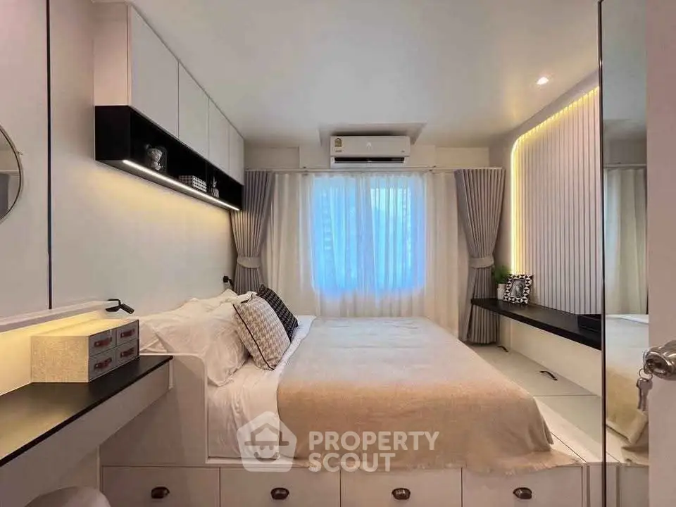 Modern bedroom with elegant decor and ambient lighting