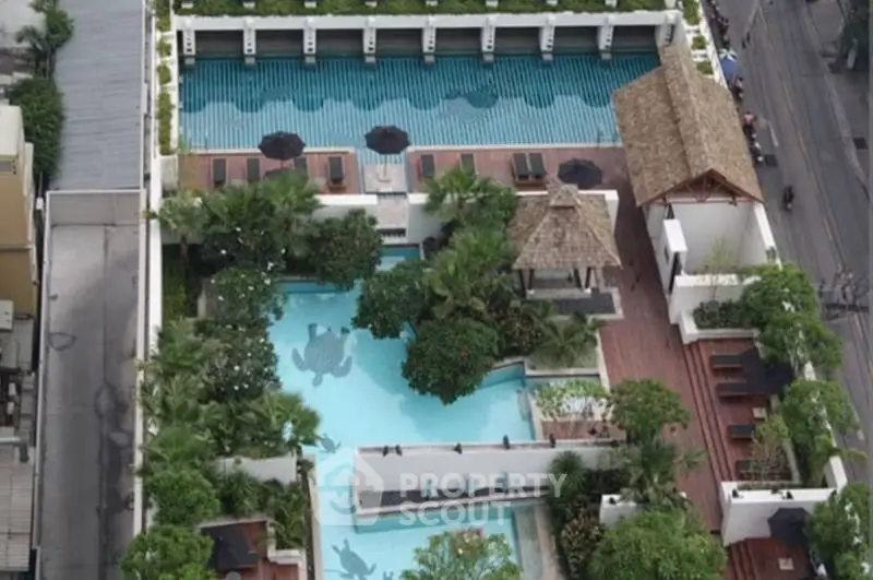 Luxurious rooftop pool with lush greenery and elegant design in urban setting.