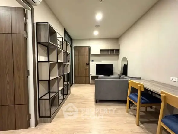 Modern living room with stylish furniture and open layout in a contemporary apartment.