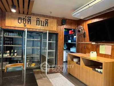 Charming rustic kitchen with wooden accents and modern appliances, perfect for culinary enthusiasts.