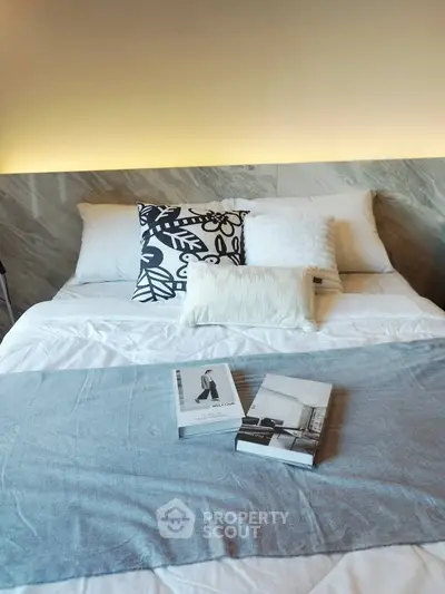 Luxurious bedroom with stylish decor and cozy bedding, perfect for relaxation and comfort.