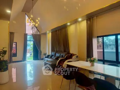 Luxurious modern living room with high ceilings and elegant decor