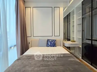 Modern bedroom with stylish decor and ample natural light