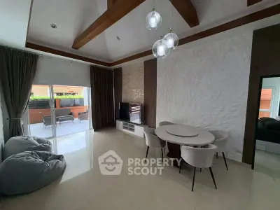 Modern living room with elegant dining area and stylish decor