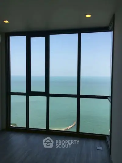 Stunning ocean view from high-rise apartment window