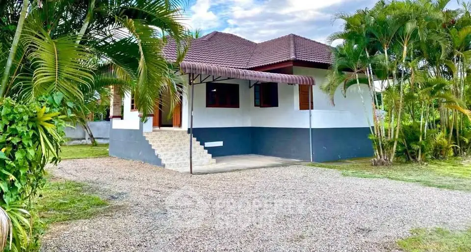 Charming single-story home with lush garden and spacious driveway