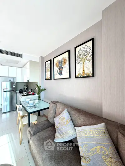 Modern living room with stylish decor and open kitchen layout