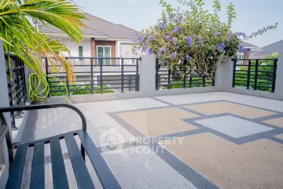 Spacious balcony with modern design and lush greenery view