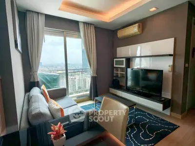 Modern living room with city view, stylish furniture, and natural light.